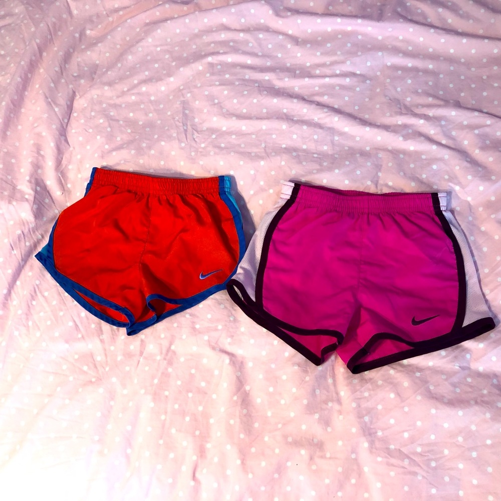 Two pairs of girls 4T Nike running shorts. Both have built in liner / undies
